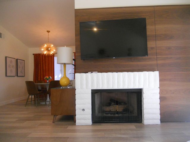 a view of livingroom with furniture and fireplace