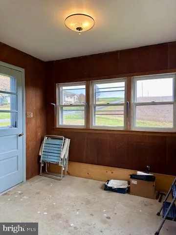 a room with furniture and windows