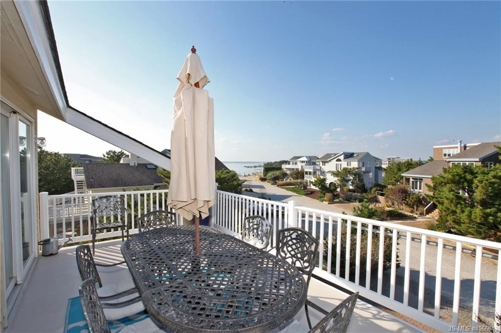 Undisclosed Address Beach Haven, NJ 08008 - Photo 11 of 36 a view of a deck with a chair