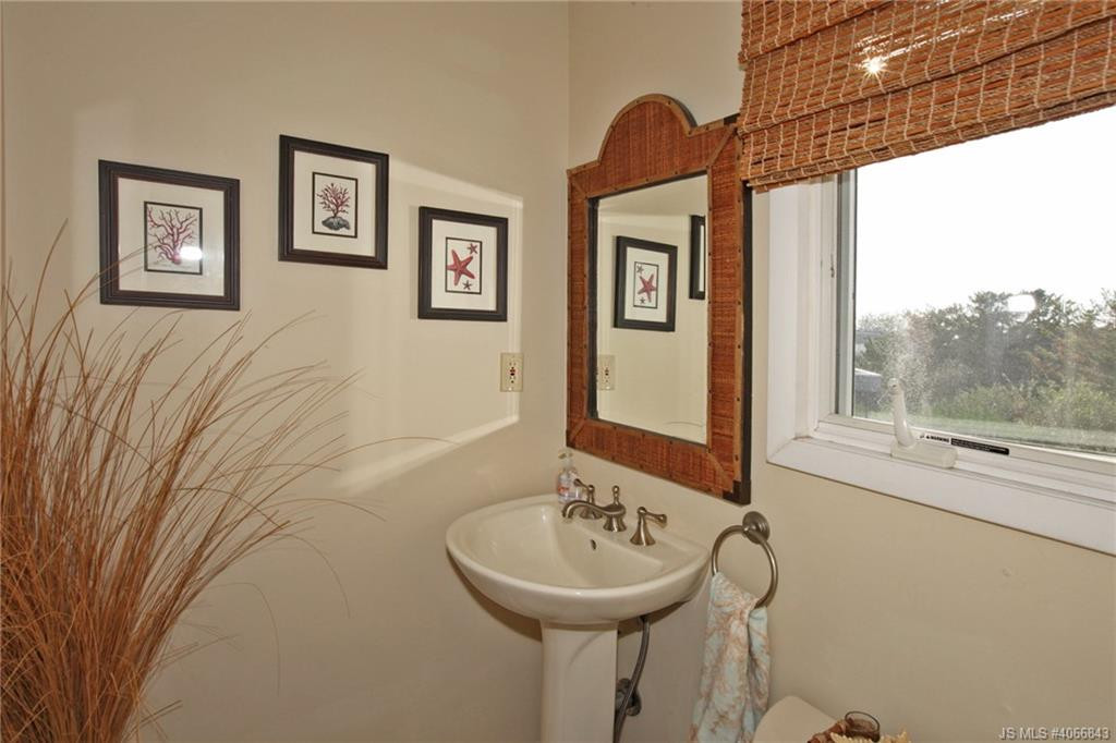 Undisclosed Address Beach Haven, NJ 08008 - Photo 14 of 36 a bathroom with a sink and a mirror