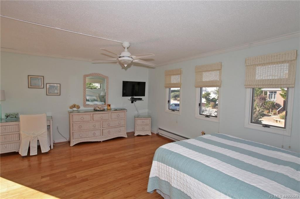 Undisclosed Address Beach Haven, NJ 08008 - Photo 16 of 36 a bedroom with furniture and window