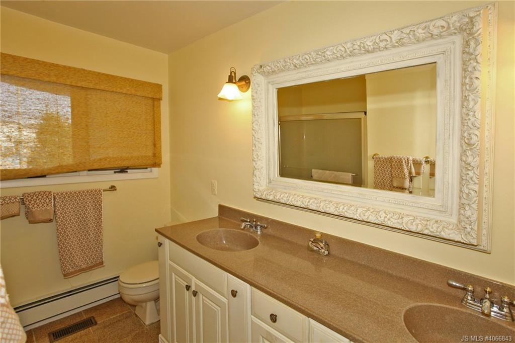 Undisclosed Address Beach Haven, NJ 08008 - Photo 17 of 36 a bathroom with a granite countertop sink toilet and shower
