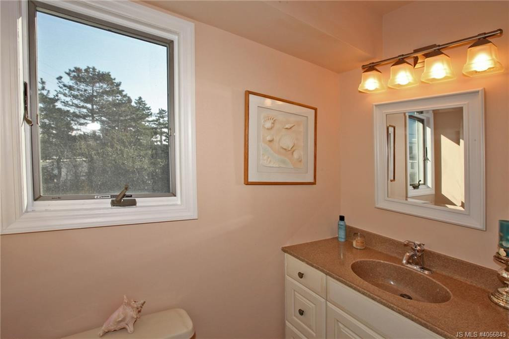 Undisclosed Address Beach Haven, NJ 08008 - Photo 20 of 36 a bathroom with a toilet sink and mirror