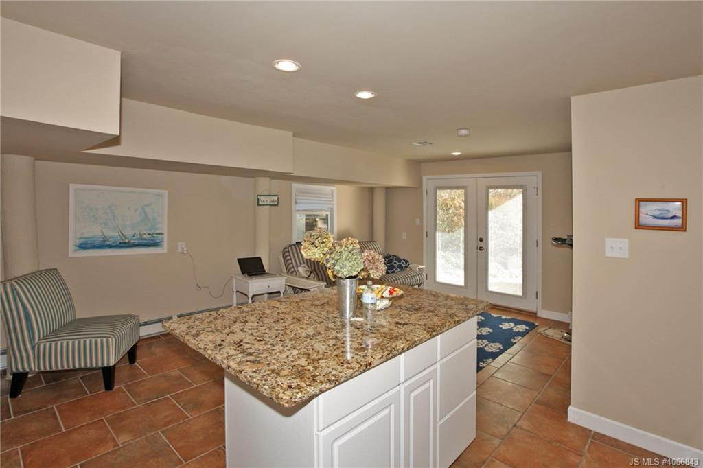 Undisclosed Address Beach Haven, NJ 08008 - Photo 21 of 36 a view of a kitchen area with furniture and wooden floor