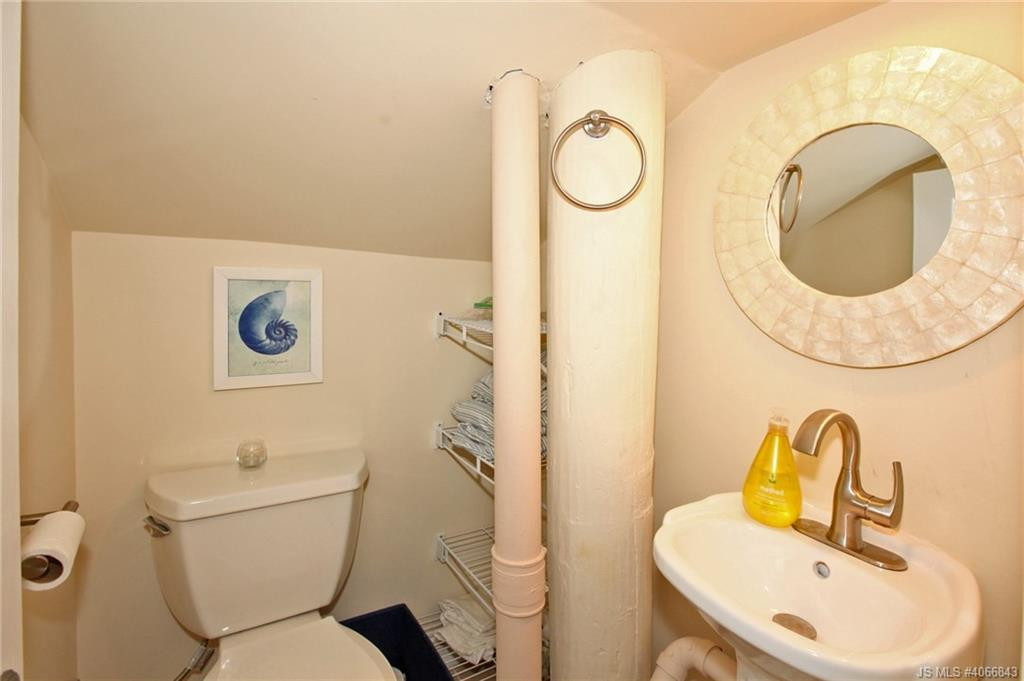 Undisclosed Address Beach Haven, NJ 08008 - Photo 28 of 36 a bathroom with a sink mirror vanity and toilet