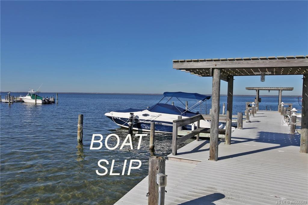 Undisclosed Address Beach Haven, NJ 08008 - Photo 3 of 36 a view of a patio with table and chairs