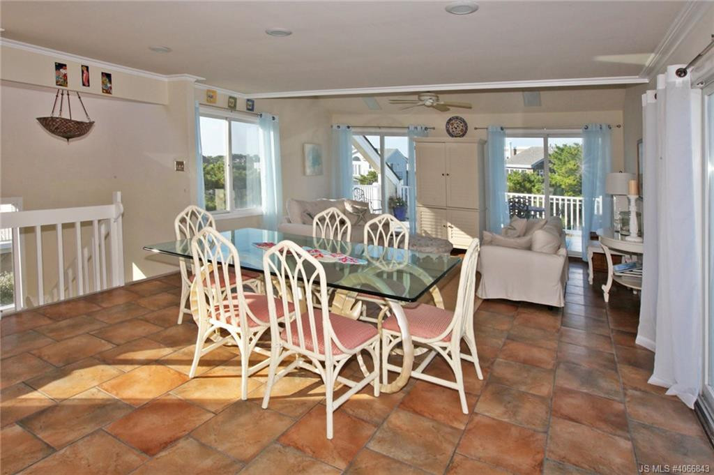 Undisclosed Address Beach Haven, NJ 08008 - Photo 7 of 36 a view of a dining room with furniture window and outside view