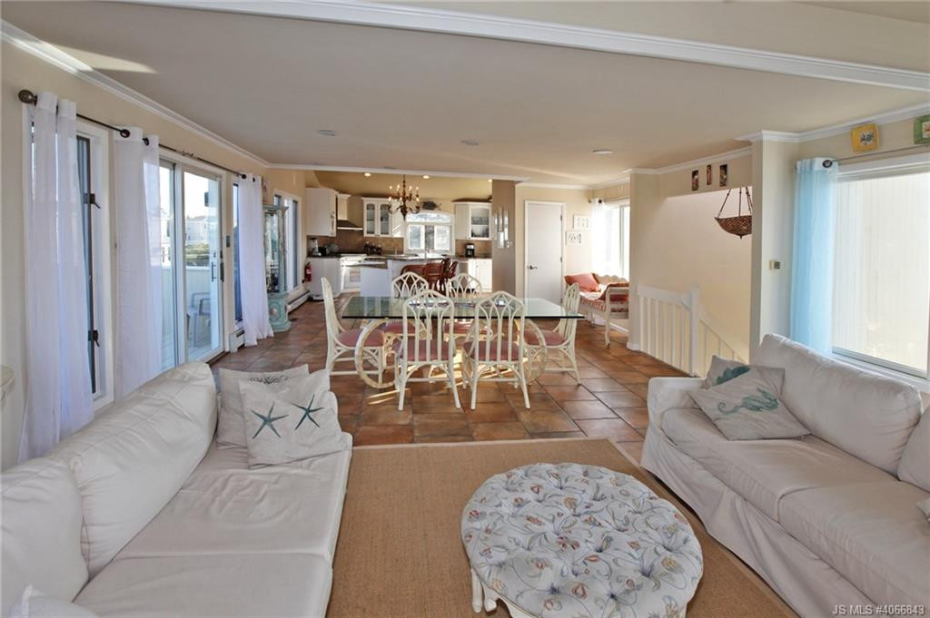Undisclosed Address Beach Haven, NJ 08008 - Photo 10 of 36 a living room with furniture wooden floor and a large window