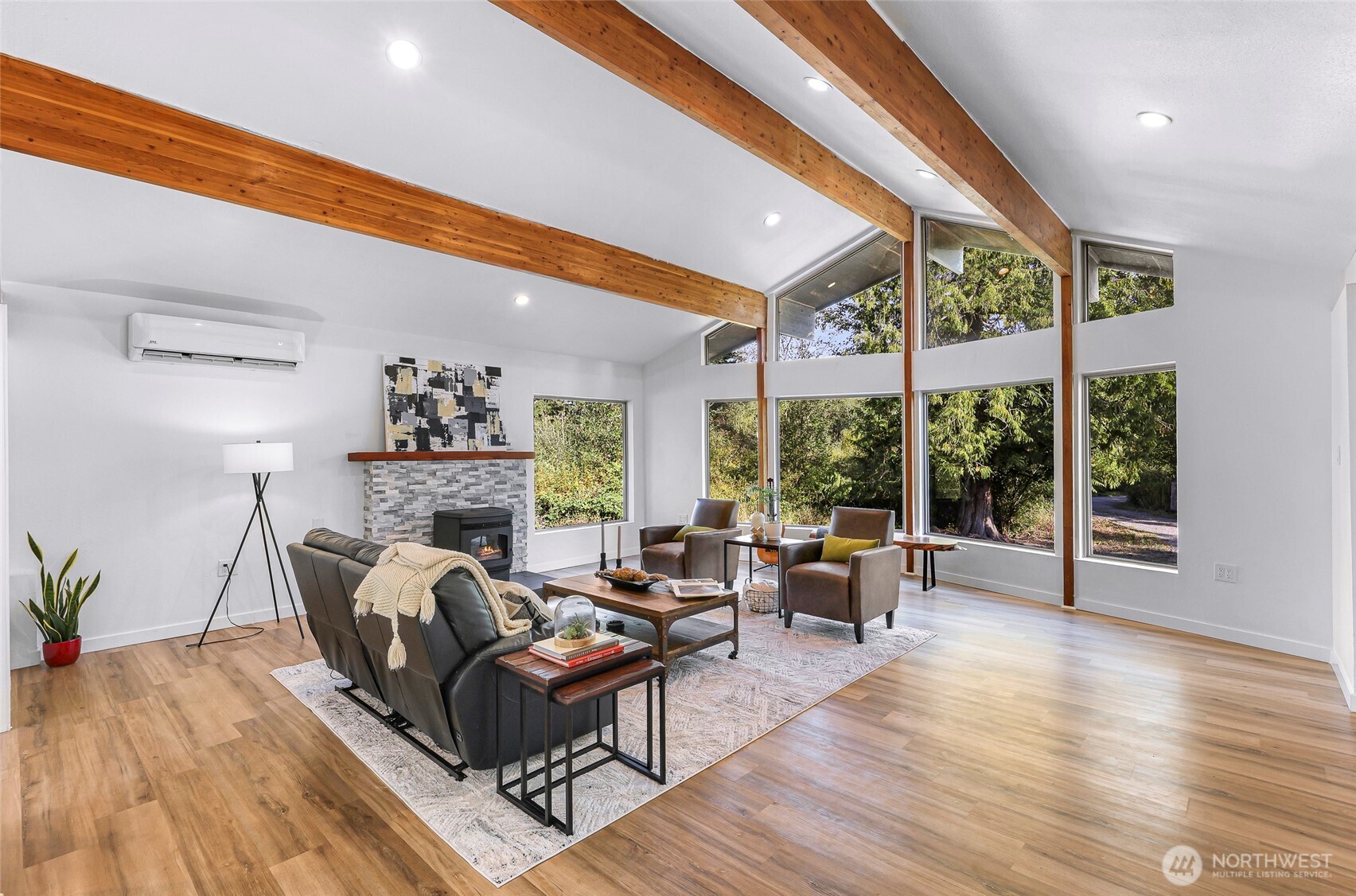 4104 Loomis Trail Road Blaine, WA 98230 - Photo 12 of 40 a living room with furniture large windows and wooden floor