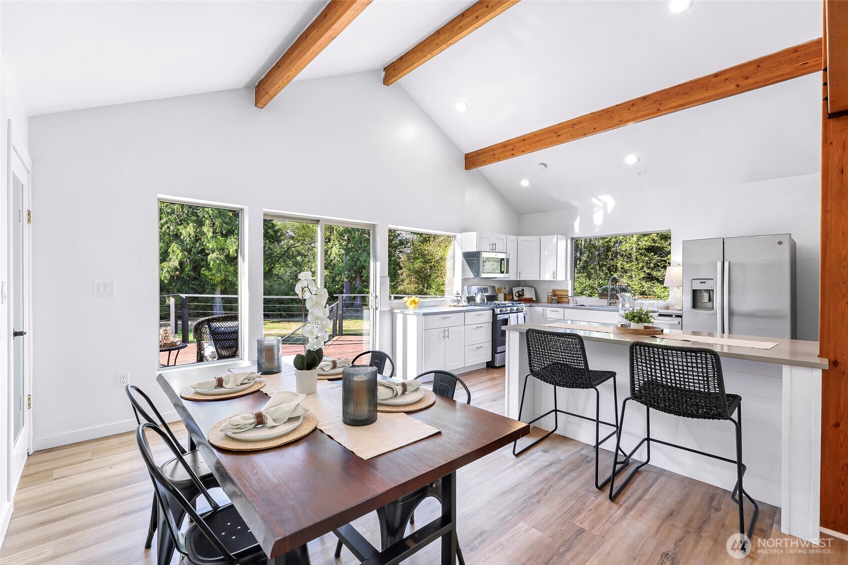 4104 Loomis Trail Road Blaine, WA 98230 - Photo 14 of 40 a view of a dining room with furniture window and outside view