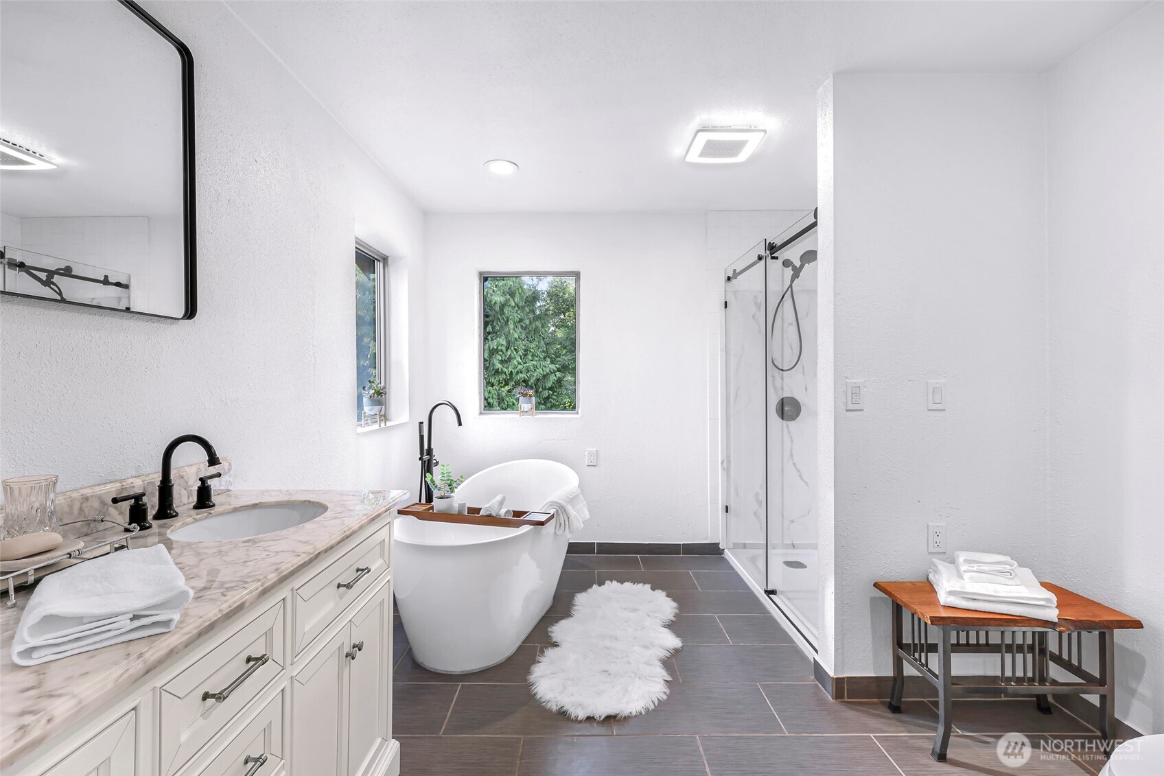 4104 Loomis Trail Road Blaine, WA 98230 - Photo 23 of 40 a bathroom with a double vanity sink toilet and shower
