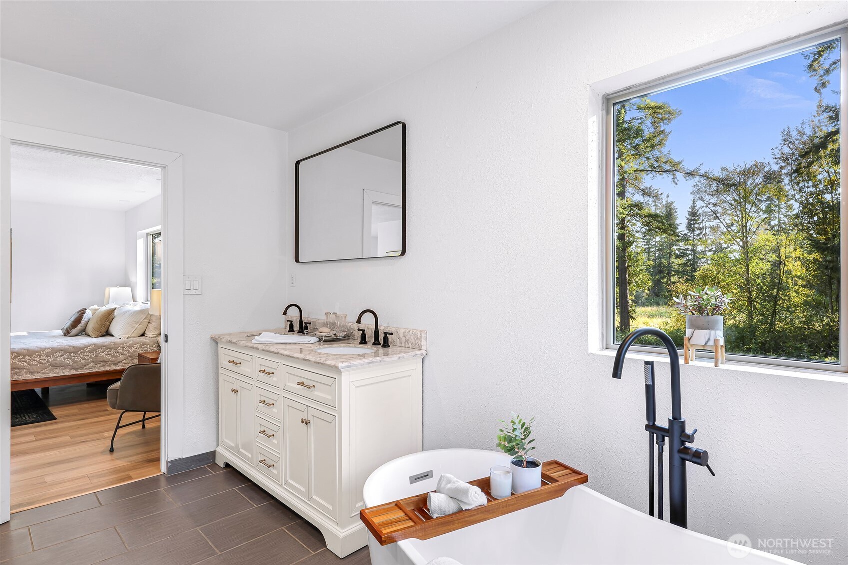 4104 Loomis Trail Road Blaine, WA 98230 - Photo 24 of 40 a bedroom with a bed and a window