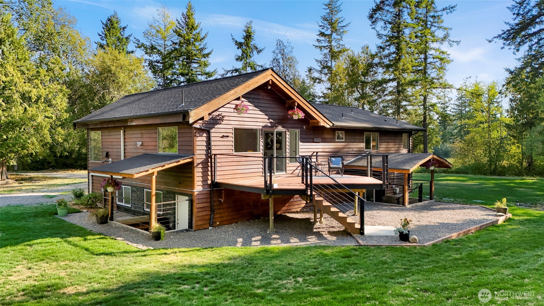 4104 Loomis Trail Road Blaine, WA 98230 - Photo 4 of 40 a view of a house with a yard porch and sitting area