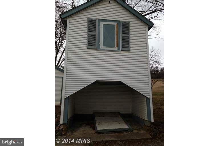 12401 Back Creek Valley Road Hedgesville, WV 25427 - Photo 11 of 32 Shed witgh root celar