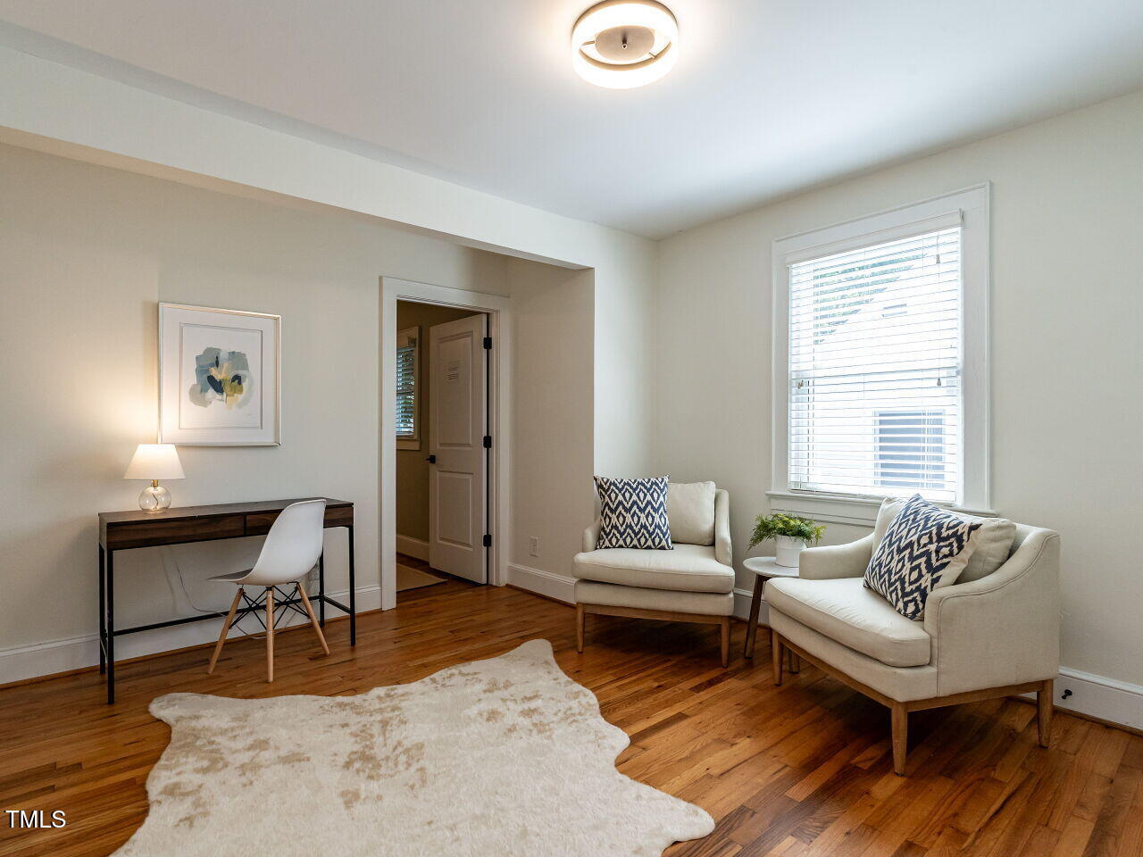1510 Hanover Street Raleigh, NC 27608 - Photo 14 of 22 a living room with furniture rug and window