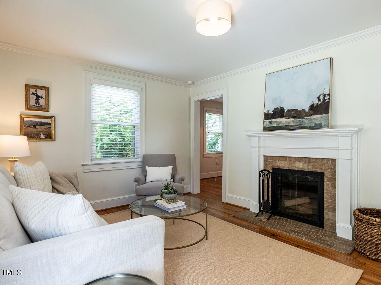 1510 Hanover Street Raleigh, NC 27608 - Photo 3 of 22 a living room with furniture a window and a fireplace
