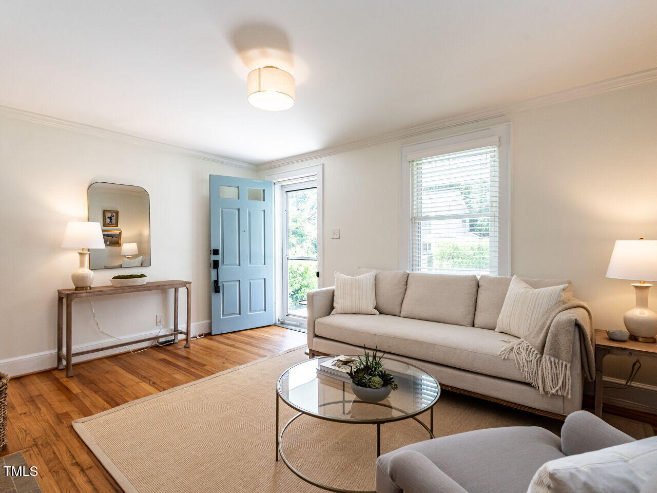 1510 Hanover Street Raleigh, NC 27608 - Photo 5 of 22 a living room with furniture and a wooden floor
