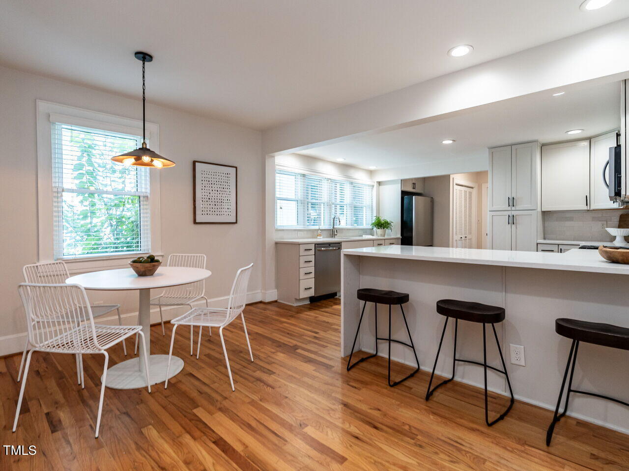 1510 Hanover Street Raleigh, NC 27608 - Photo 6 of 22 a view of a dining room with furniture window and wooden floor
