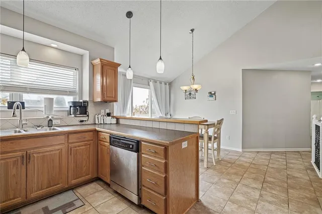 $360,000 | 607 Bradford Court, Raymore, MO 64083