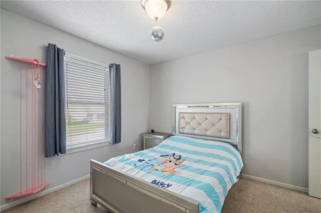 $360,000 | 607 Bradford Court, Raymore, MO 64083