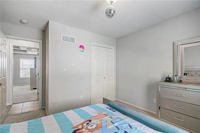 $360,000 | 607 Bradford Court, Raymore, MO 64083