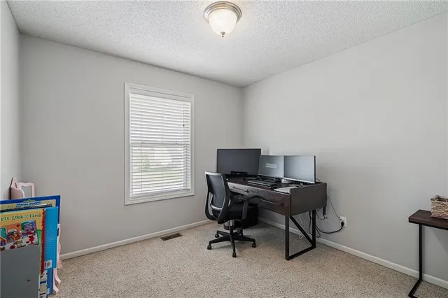 $360,000 | 607 Bradford Court, Raymore, MO 64083