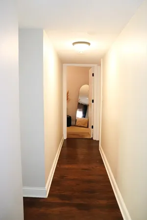 a view of a bedroom from a hallway
