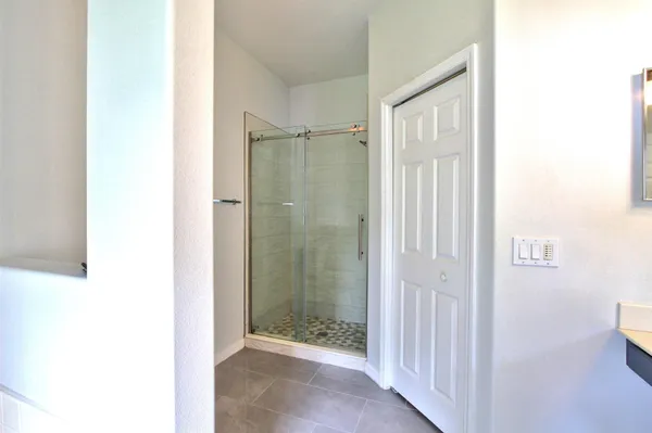 a view of a room with racks on the wall