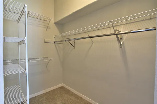 a bathroom with a double vanity sink mirror and double