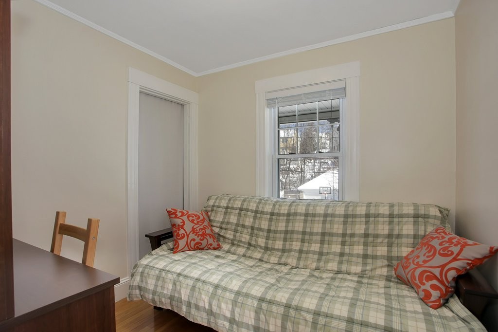 14 Russell Road, Unit 14 Winchester, MA 01890 - Photo 14 of 18 a bedroom with a bed and a window
