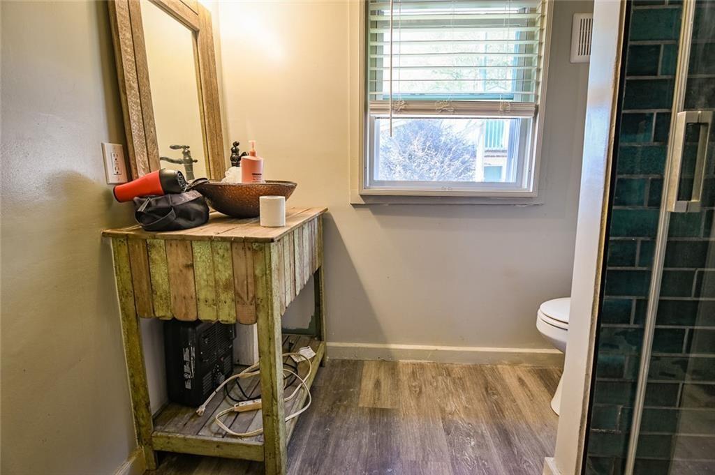 12462 Brown Bridge Road Covington, GA 30016 - Photo 14 of 31 a room with furniture and a window
