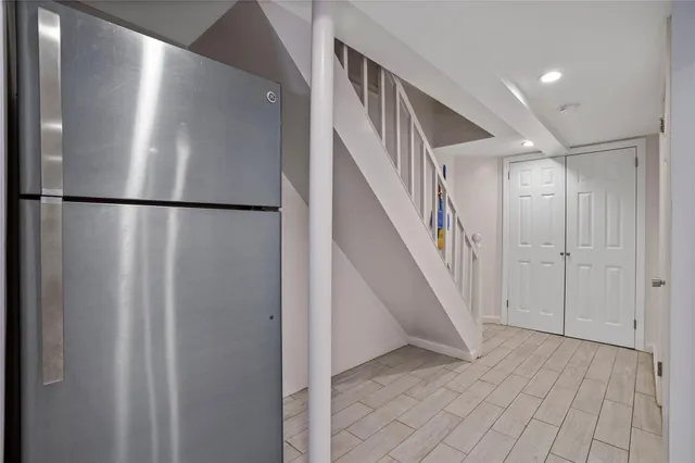 a view of a hallway with staircase