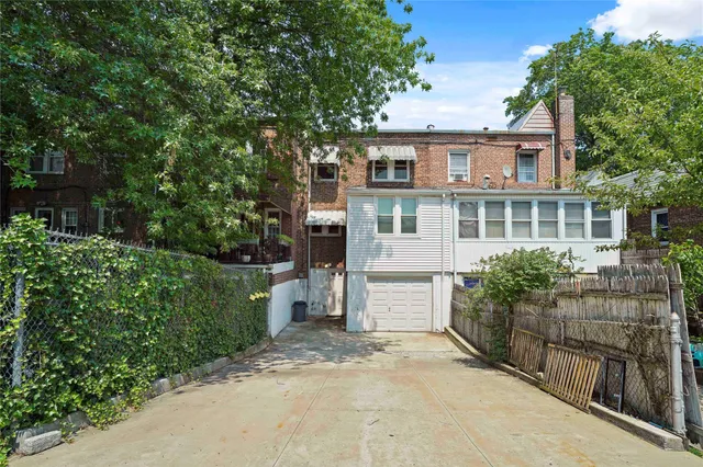 a house with trees in front of it