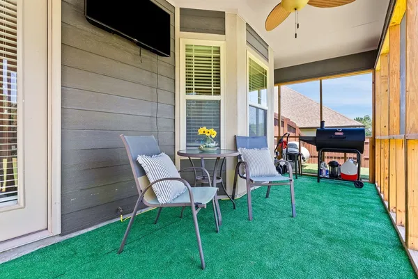 a view of an chairs in backyard of the house