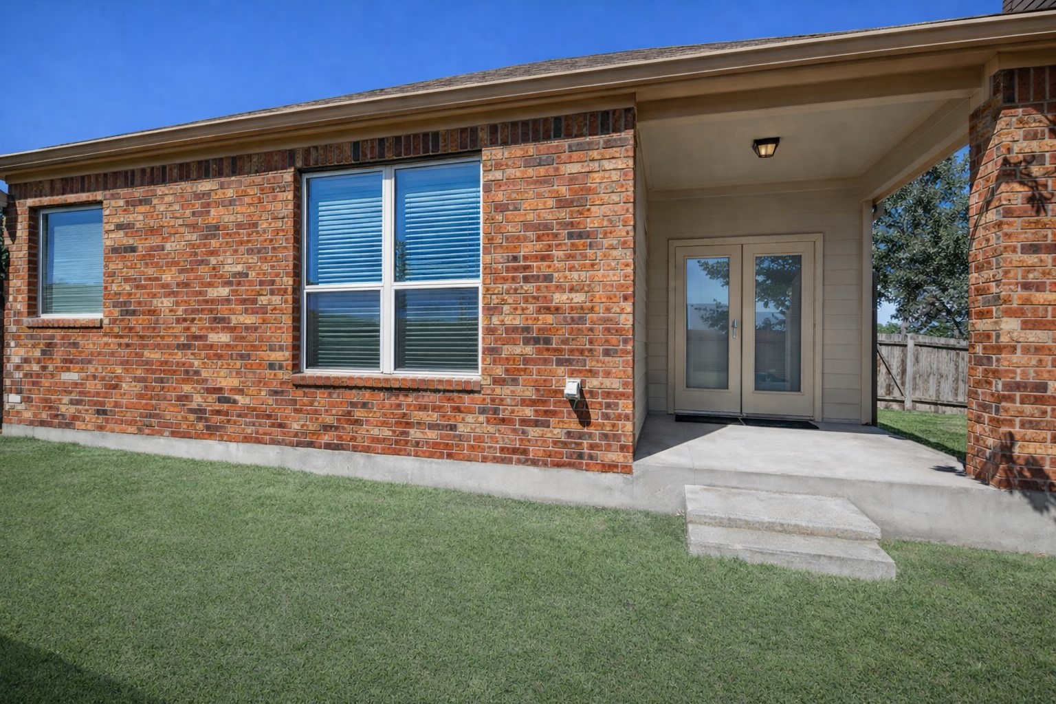 3451 Mayfield Ranch Boulevard, Unit 216 Round Rock, TX 78681 - Photo 29 of 33 a front view of a house with a yard