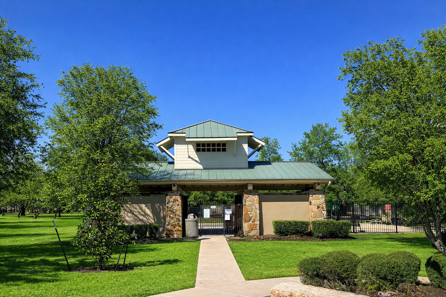 3451 Mayfield Ranch Boulevard, Unit 216 Round Rock, TX 78681 - Photo 30 of 33 a front view of a house with a yard