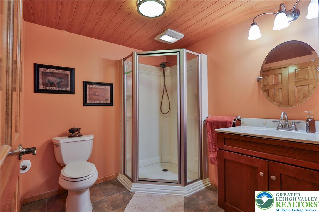 2053 Alice Drive Bethlehem, PA 18015 - Photo 26 of 31 a bathroom with a toilet sink and mirror