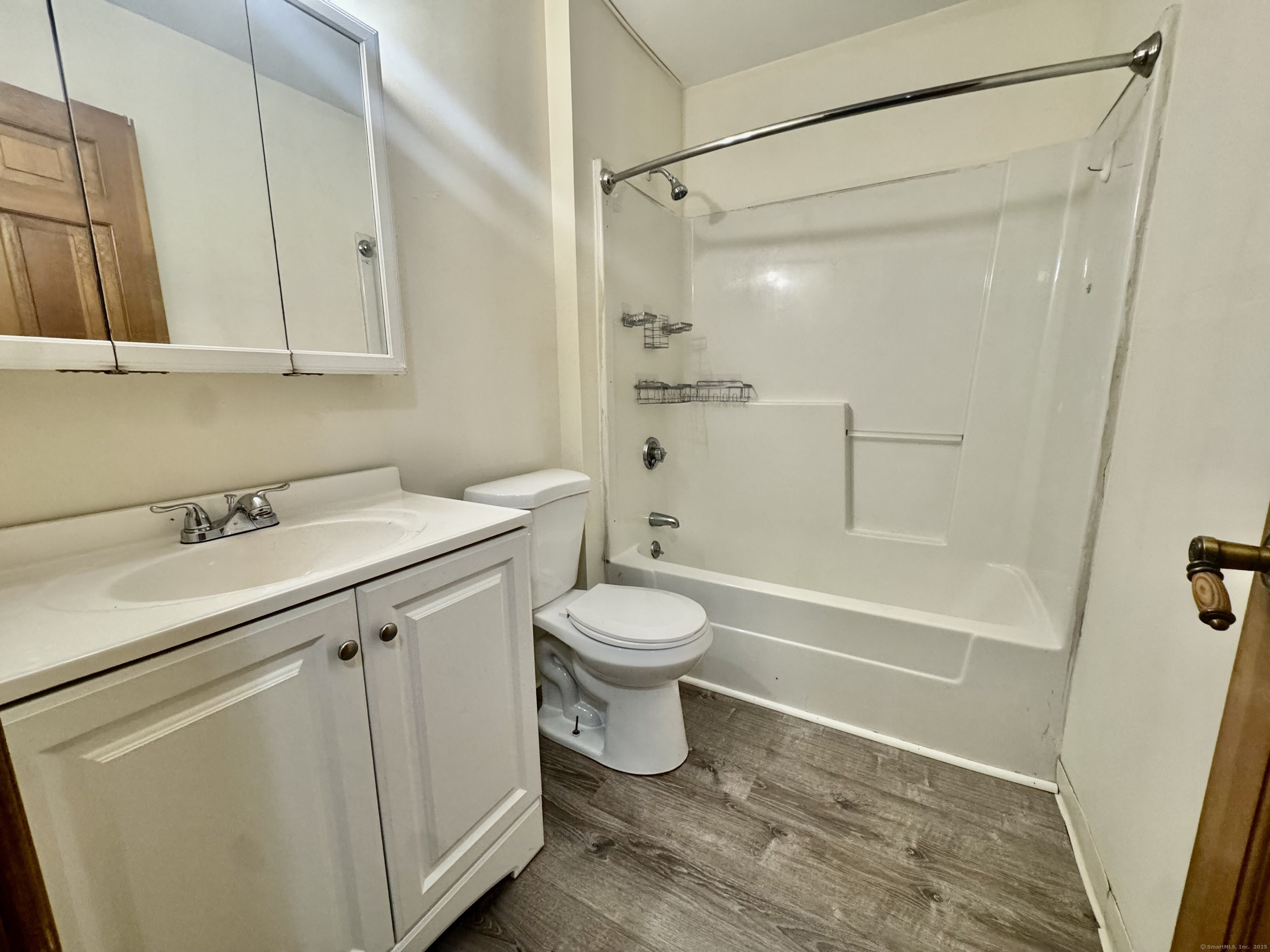 24 West Road, Unit 44 Ellington, CT 06029 - Photo 5 of 9 a bathroom with a sink toilet and shower