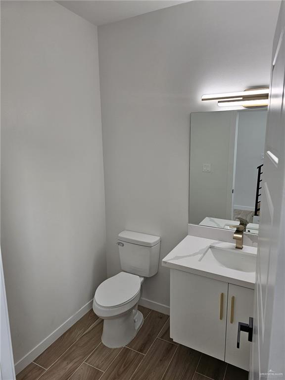 5500 North Crown Point Pharr, TX 78577 - Photo 14 of 39 a bathroom with a sink and a toilet