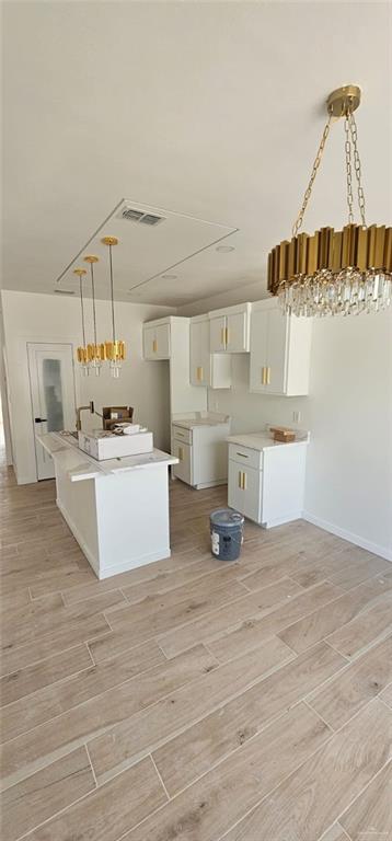 5500 North Crown Point Pharr, TX 78577 - Photo 29 of 39 a view living room with kitchen island stainless steel appliances wooden floor and living room view