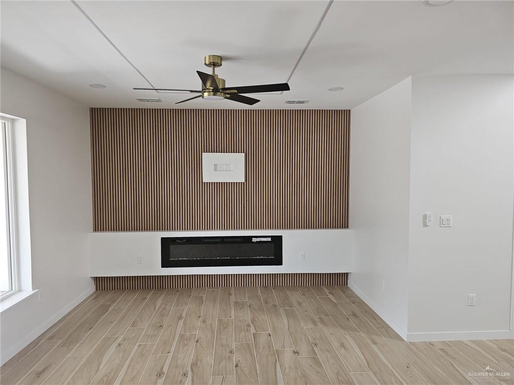 5500 North Crown Point Pharr, TX 78577 - Photo 6 of 39 a view of an empty room with wooden floor