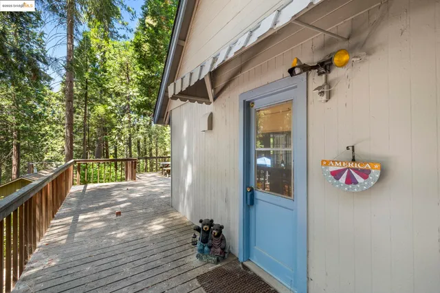 a view of a balcony with wooden floor
