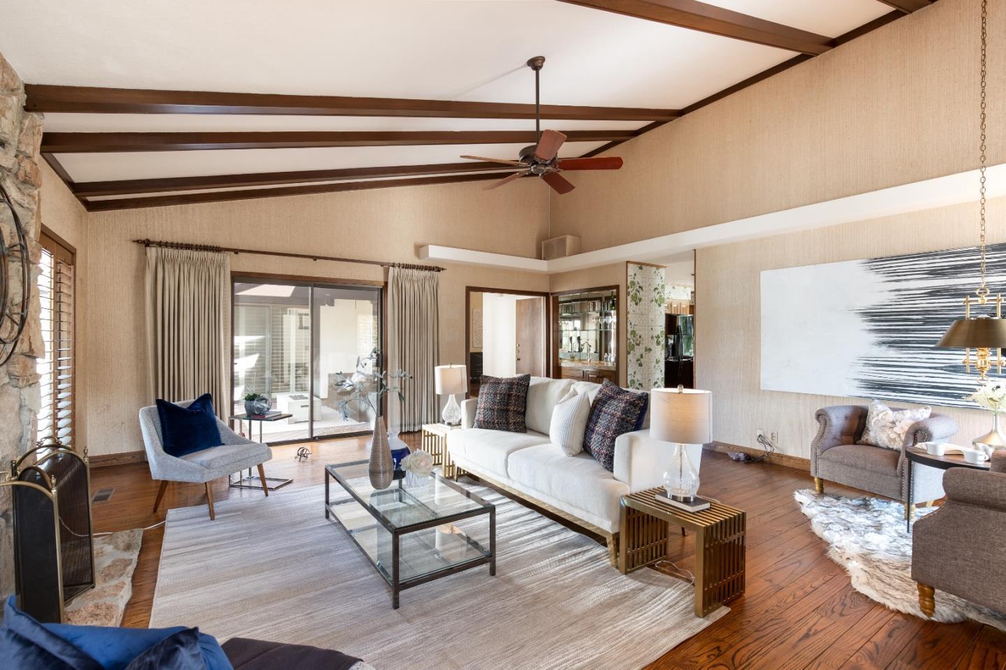 110 Stonepine Road Hillsborough, CA 94010 - Photo 12 of 28 a living room with furniture and a window