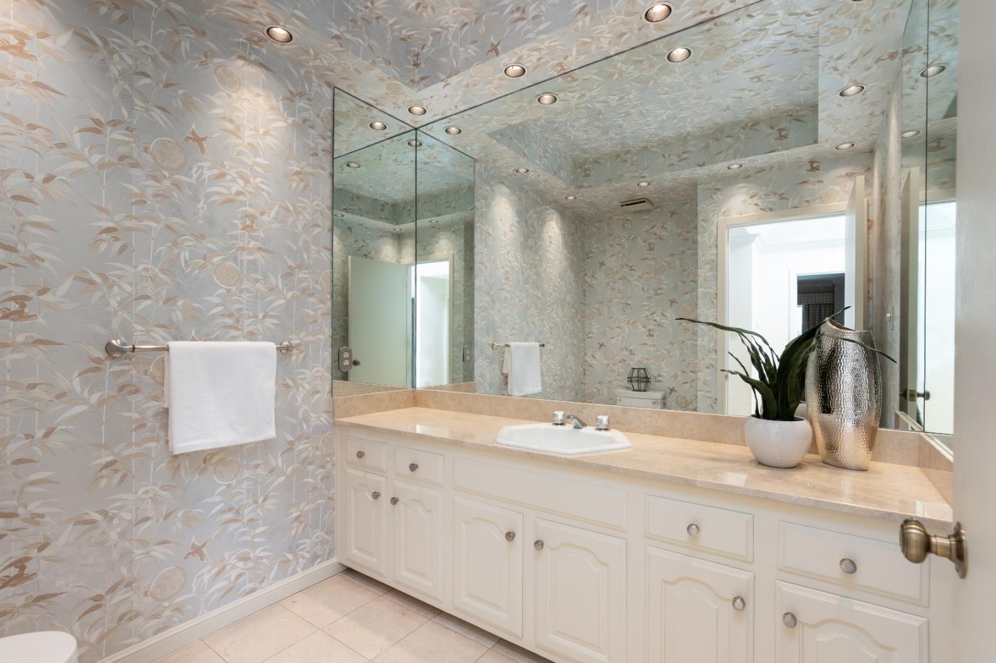 110 Stonepine Road Hillsborough, CA 94010 - Photo 14 of 28 a bathroom with a double vanity sink mirror and shower