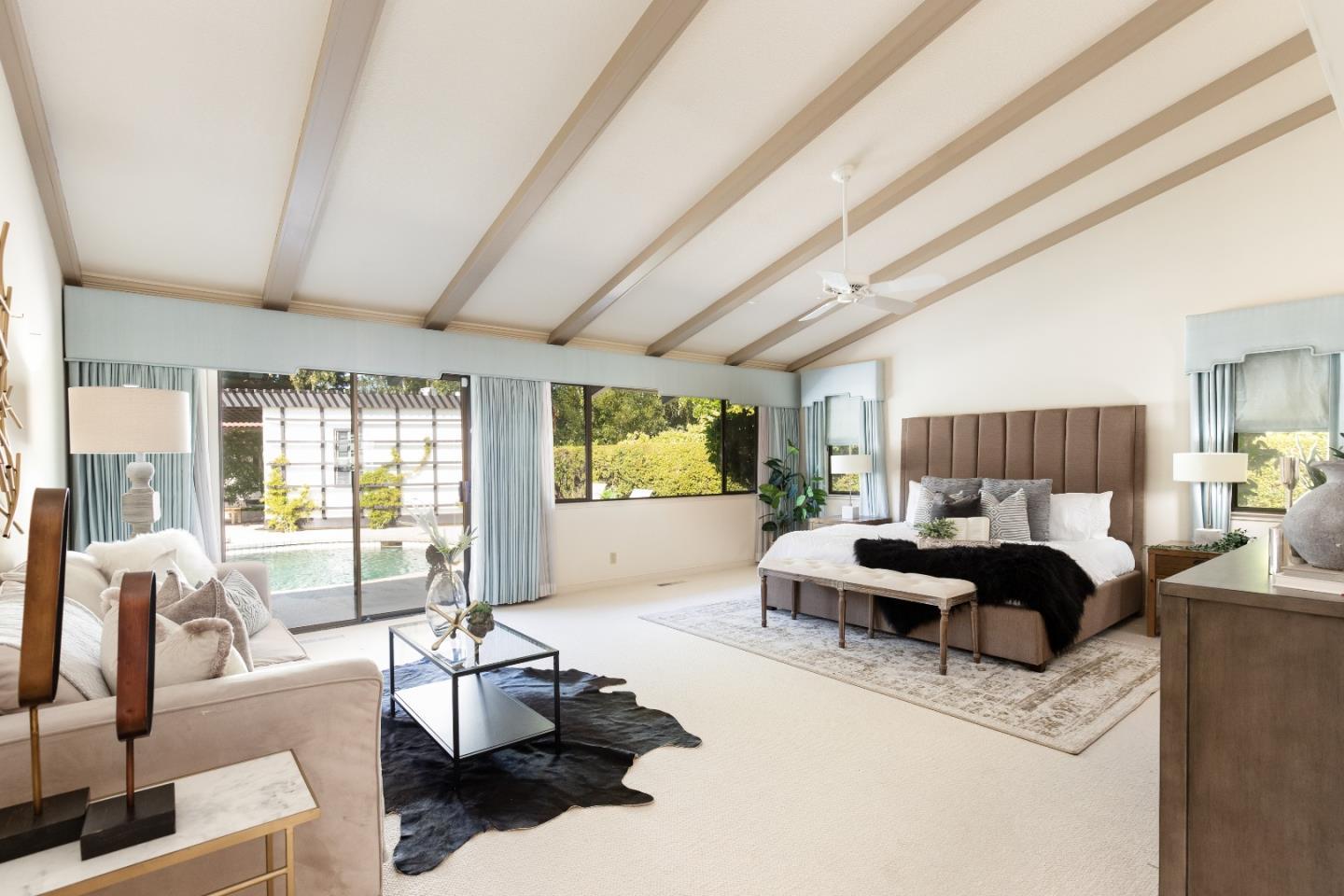 110 Stonepine Road Hillsborough, CA 94010 - Photo 15 of 28 a living room with furniture and a large window