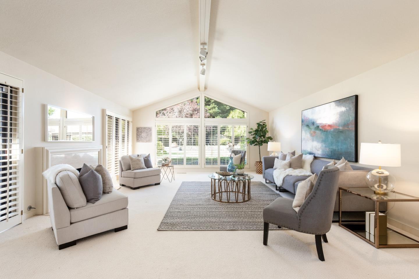 110 Stonepine Road Hillsborough, CA 94010 - Photo 6 of 28 a living room with furniture and a large window