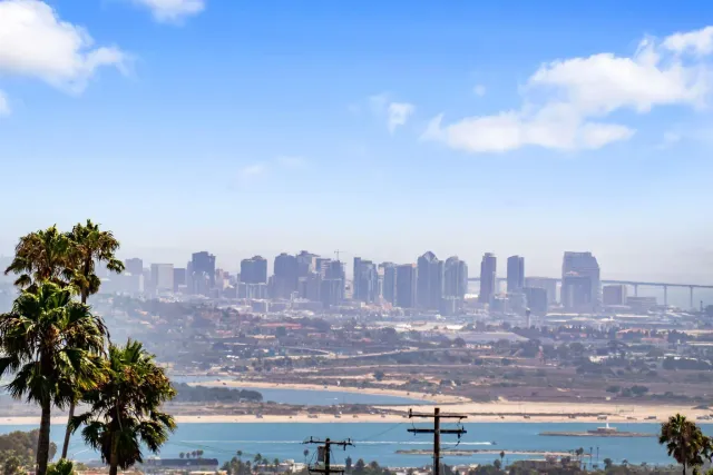 a view of a city with tall buildings in the background