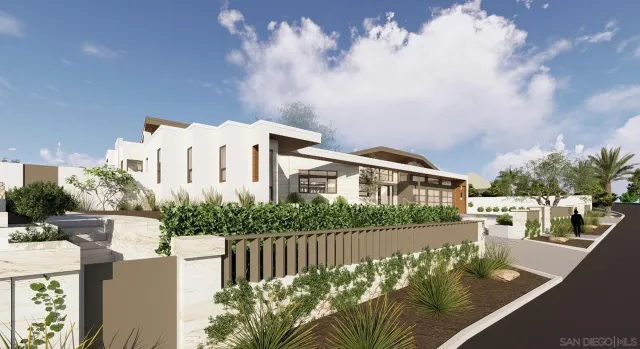 a view of a house with backyard and garden