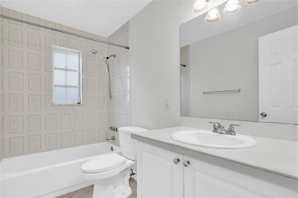 8600 Southwest 109th Avenue, Unit 4101 Miami, FL 33173 - Photo 15 of 34 a bathroom with a sink toilet and shower