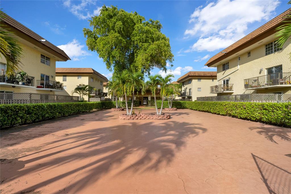 8600 Southwest 109th Avenue, Unit 4101 Miami, FL 33173 - Photo 2 of 34 a view of a building with a street